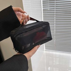 Kadınlar için örgü makyaj çantası 2023 Yeni moda el tipi büyük kapasiteli yıkama torbası taşınabilir şeffaf makyaj torbası depolama çantası 231015