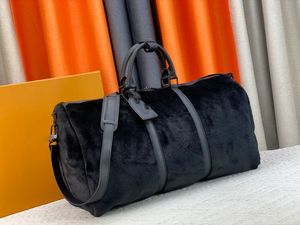 Borsa da viaggio in pelle di lana con cinturino laterale in pelle Oudan Teddy Bear