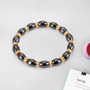 Braccialetti con ciondoli Raffreddano il braccialetto magnetico in lega di ematite con pietra terapeutica per il braccialetto sanitario Unise