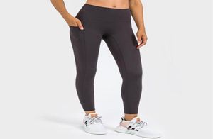 Pantaloni da yoga Tasca laterale Cuciture a vita alta Tinta unita Sport casual Capris Corsa Fitness Abbigliamento da palestra Donna039s Leggings9411785