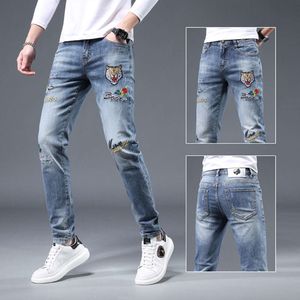 Designer lila varumärke jeans för män kvinnor byxor lila jeans modemärke herr tiger huvud broderad elastisk smal passform liten fot jeans för män 733