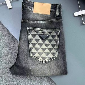 Designer classic luxury men's printed letter triangle label vintage wash jeans Loose stretch straight wash wear resistant top row patch casual pants