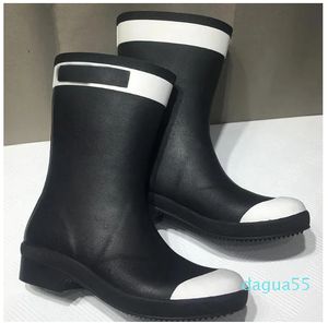 Designer kvinnor Autumn Winter Fashion Ladies Shoes Rainboots Black White Mixed Color Booties Low Heel Womens