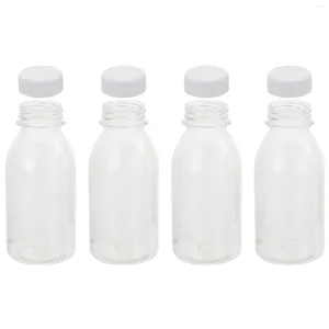 Вода бутылки сока хранения молока прозрачна