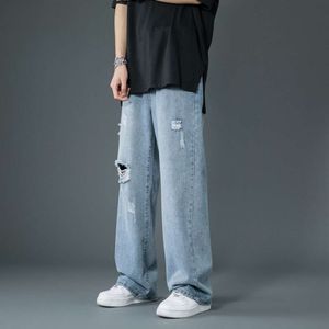 Våren sommarmän s rippade breda ben jeans koreansk trend rak baggy denim byxor manliga vintage blå byxor