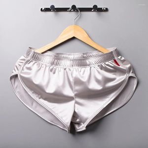 Underbyxor Sexiga män Ice Silk Briefs Solid Color Boxers Shorts Soft Loose Underwear Smooth Sleepwear Man Gay Penis 2023