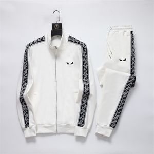 2 herrspårsdräkter Designer Mens Tracksuit Luxury Men Sweatsuits Lång ärm klassisk modeficka som kör casual man kläder kläder byxor jacka två bit #126