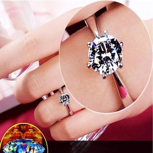 Klassisk designer Six Claw Silver Color Ring Österrike Crystal Diamond Wedding Ring for Bridal Christmas Gift for Women Jewelry Engag263f