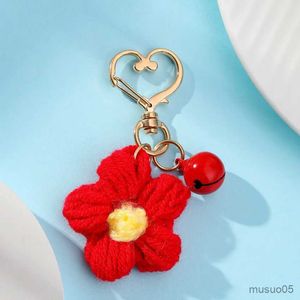 Mobiltelefonkedjan Ny nyckelring Röd ull Sun Flower Belt Bell Accessories Cute Flower Bag Hanging Ornament Keychain R231031