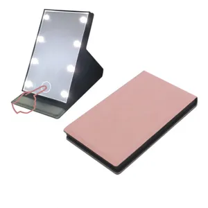 Specchi compatti pieghevoli all'ingrosso Specchio per il trucco portatile con 8 perline a LED con pacchetto di archiviazione in PU leggero