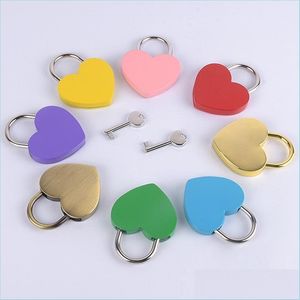 Party Favor Valentine Day 11 Colors Heart Shaped Concentric Lock Metal Mitcolor Key Padlock Gym Toolkit Package Door Loc Homeindustry Dhk46