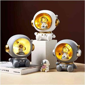 Figurine decorative Astronauta Cartone animato Scultura Decorazione Luce notturna Serbatoio di stoccaggio Accessori per la decorazione della casa per soggiorno Regalo di compleanno del ragazzo