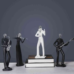 装飾的な置物ロックバンドミュージックキャラクター図形ミュージシャン彫刻北欧スタイル樹脂彫像オフィスリビングルーム机の装飾家の装飾
