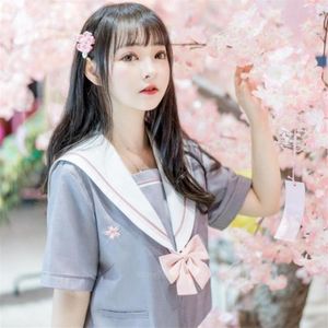 Set di abbigliamento Uniforme scolastica giapponese JK Girl Women Anime Gonna a pieghe Sakura Ricamo Kawaii Sailor Collar Costume da studentessa