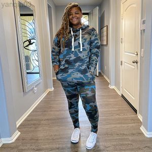 Women's Plus Size Tracksuits Winter Winter Hoodies 2 مجموعة من الملابس النسائية أعلى الأكمام الطويلة والسراويل مجموعة التمويه بالإضافة