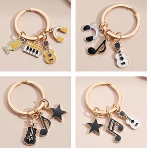 Hot Selling Key Ring Pentagram Microphone Liten doftande fiol Obs Tangentbordets headset Keychain Pendant