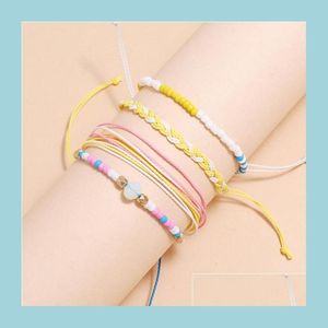 Andra armband 4st/set Friendship Woven Mti-Layers Armband Waterproof Wax String Rope P￤rlor Boho fl￤tade smycken Bangle Q Lulubaby DH5S8