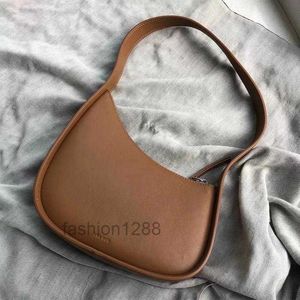 Designer La borsa a tracolla a mezzaluna in pelle kendou ad alta trama con design di nicchia estiva con lo stesso stile