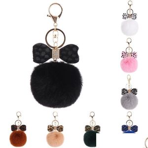 Ключевые кольца Pompom Клавичный матч искусственный кролик Keyrings Leopard Crystal держатель клавиш пушистый меховый мяч -мяч -брелки для женской сумки Carm Charm Mjfashion dhw8b