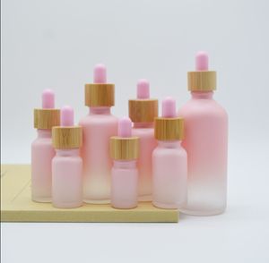 5-100 ml rör rosa droppglasflaskor Aromaterapi vätska för väsentlig massage oljepipett påfyllningsbara flaskor bambuskydd