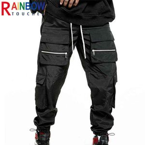 Pantaloni da uomo Cargo Uomo Pantaloni casual Pantaloni con tasca con zip di grandi dimensioni Pantaloni da uomo Trend con coulisse con divaricatore per piedi Qualità superiore Rainbowtouches T220909