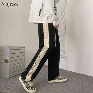 Calças masculinas Black Patchwork Side Stripe Casual Pants Men Botões High Street Moda Teenager DrawString Ins LOW STROURSS TRUSHERS ULZZANG T220909