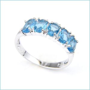 Three Stone Rings Holiday Gift 925 Sier Plated Oval Blue Topaz Gems For Women Rings Lover Wedding Party Jewelry R0434 Drop Delivery 20 Dh48F