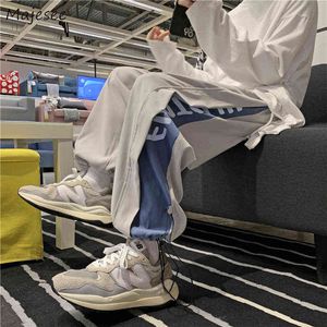 Pantaloni da uomo Pantaloni da uomo Preppy Streetwear Adolescenti Coreano Elegante Harajuku Design Moda Hip Hop Bello Pantnes Casual Largo Lato a righe T220909