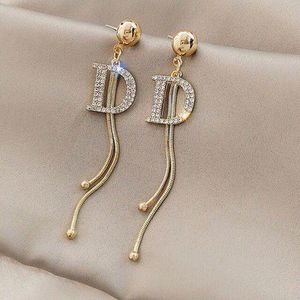 Designer Jewelry Dangle Sier Needle Micro-zircon Earrings Snake Bone Chain Tassel Earring D Words 2024 00