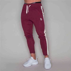 Męskie spodnie 2019 Joggers Casual Fitness Sportswear Bottoms chudy spodnie dresowe spodnie czarne siłownię jogger pot t220909