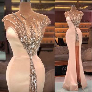Sexy Mermaid 2022 Pink Prom Dresses Cap Sleeves Illusion Crystal Beading Floor Length Side Split Evening Party Gowns Special Ocn Wears