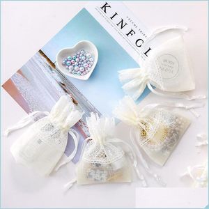 Шахта для ювелирных мешков Creative Style White Feather Lace Gift Package Полученные ювелирные украшения Оптовая бамбуковая пряжа Dhseller2010 Dhmiw