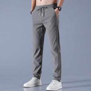 Calça masculina verão fino gelo fino seda reta calça casual cor sólida cor-de-cintura solta esportes de secagem rápida para masculino