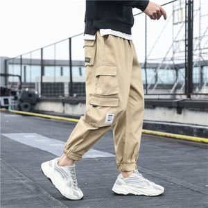 Pantaloni da uomo Tasche laterali da uomo Pantaloni cargo Pantaloni hip-hop neri Harem Pantaloni casual da uomo Pantaloni sportivi Pantaloni streetwear moda 5XL 220914