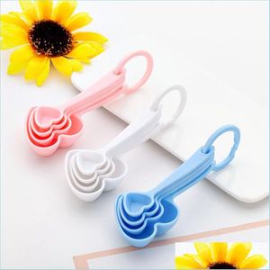 Strumenti di misurazione Cucchiaio Cucchiai dosatori a forma di cuore Regalo di souvenir di nozze Baby Shower Bomboniera Cucina Cottura Regali di plastica Goccia D Dhmdp