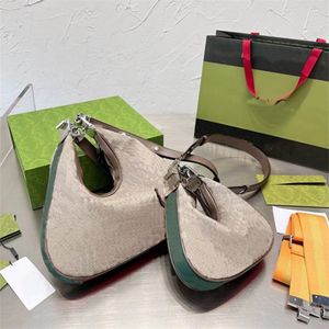 Damen-Umhängetasche, Damen-Unterarmtaschen, Damen-Designer-Tragetasche, Marke, luxuriöse Kombinationsschloss-Halbmondtasche, bedruckte Handtaschen mit roten und grünen Streifen, braune Handtasche