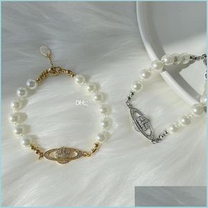 Urok Bracelets Western West Queen z tą samą gwiazdą drewna Vivi Pearl Bracelets European and American Fashion INS1 /1 Brass Cl Dhfmd