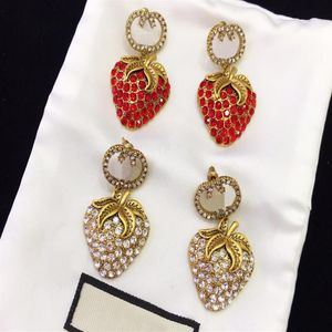 Wholesale strawberry diamonds for sale - Group buy America Fashion Style Lady Women Brass Engraved G Initials White and Red Diamond Strawberry Stud Earrings Color284u