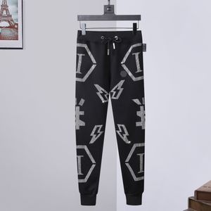 PLEIN BEAR Pantaloni da uomo PANTALONI DA JOGGING STONES GOTHIC PP Skulls Pantaloni da donna da uomo Sport Designer di lusso Pantaloni della tuta Pantaloni da jogging con coulisse Coppia Abbigliamento di marca 84604