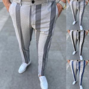 Pantaloni da uomo Moda primavera autunno Patchwork a righe Business Casual Slim Fit Pantaloni maschili a figura intera Abbigliamento