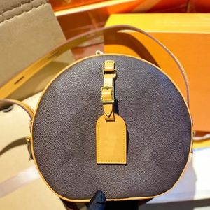 2022 axelväskor Kvinnor Luxurys Circle Crossbody Bag designers runda handväskor handväska gammal blomma brun äkta läder axelväska