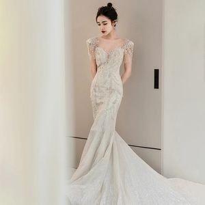 Sexy Mermaid Wedding Dresses Sheer neckline with Beading Sequins Sweep Train Bridal Gowns