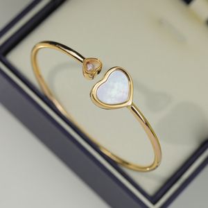 Bracciale Love femminile in acciaio al titanio design di nicchia apertura luce lusso senso senior decorazione a mano anello in oro rosa 18 carati