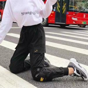 Calça masculina estilo fino mulheres cintura elástica calça de moletom folga calça de pista de hip hop para garotas streetwear