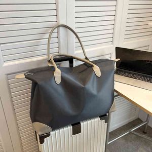 Borsoni New Outdoor Bagaglio a mano Borsa Fitness Una spalla Borsa da viaggio in nylon a breve distanza Donna Borsa a tracolla di grande capacità Uomo 220920