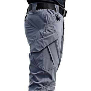Męskie dżinsy męskie spodnie taktyczne wielokrotne kieszonkowe elastyczność wojskowa miejskie spodnie Mężczyźni Mężczyźni Slim Fat Cargo Spant 5xl 220920