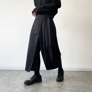 Herrbyxor elastiska midja slips culottes män harjuku streetwear trend mode lös casual svart bred ben kimono byxor man kjol byxor 220922