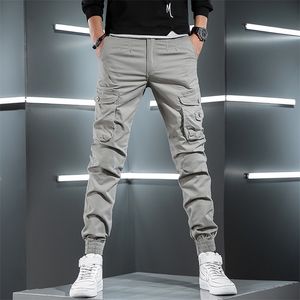 Męskie spodnie Mężczyzny Tactical Cargo Pants Streetwear Multi Pocket Hip Hop Joggers jasnoszary bawełniany Slim Fit Moders 220922