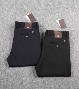 Jesienne i zimowe nowe styl Designer Pants Luksusowy jedwabny gładki elastyczny materiał Business Dżentelmen Top Brand Mens Spodni