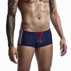 Men's Swimwear Buy Men Solid Color Boxer LaceUp Rope Sexy CloseFitting Nylon Swimming Briefs surfing Shorts 5 Colors New J220913